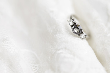 Diamond wedding ring in studio, close up