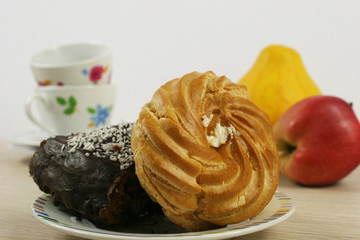 homemade chocolate cake and cup on a wooden table