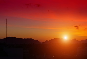 sky day red sunset  and  beautiful colorful evening nature landscape twilight time with city silhouette