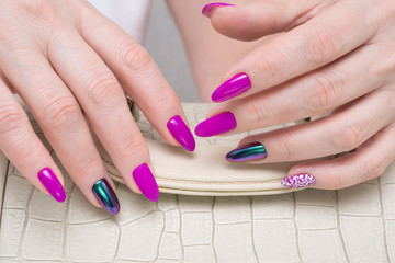 Women hands with beautiful manicure. Natural nails and gel polish.