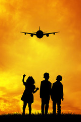 Naklejka na ściany i meble children looking the airplane