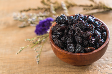 black raisins in bowl