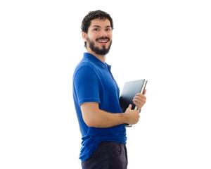 Young student holding books and smiling. Young man wearing blue polo shirt, white background, copy space.