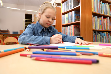 homework in the library   © wip-studio