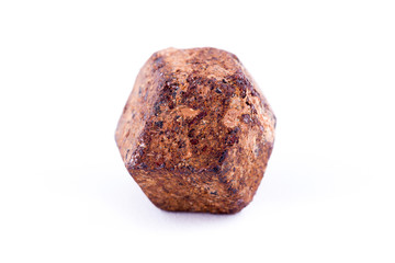 Macro stone mineral Garnet against white background
