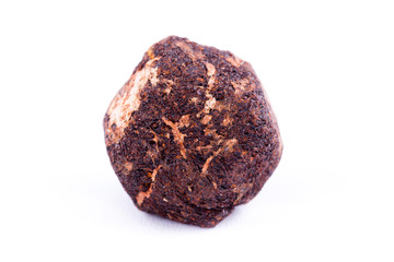 Macro stone mineral Garnet against white background