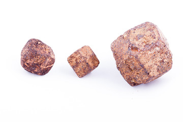 Macro stone mineral Garnet against white background