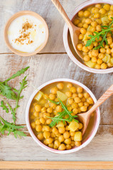 Chickpea soup on wooden background. Top view. Selective focus. Eastern cuisine
