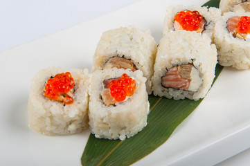 sushi roll with cream cheese, salmon, scrambled eggs, red caviar