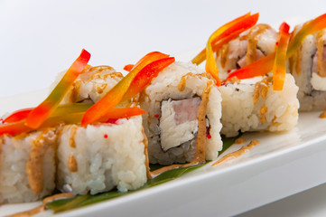 sushi roll with tuna, Philadelphia cheese, flying fish caviar, bell pepper