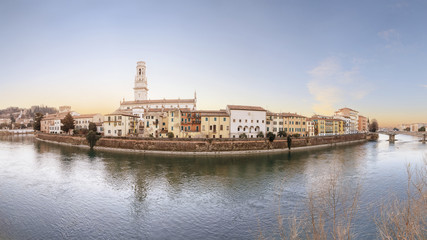 Obraz premium historical quarter of Verona, panorama from river on Duomo Cathedral at sunrise. Creative toning effect