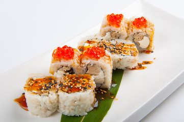 sushi roll with tuna, scrambled eggs, cream cheese and red caviar
