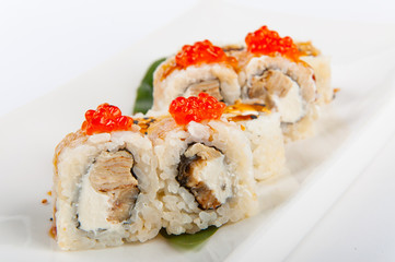 sushi roll with tuna, scrambled eggs, cream cheese and red caviar
