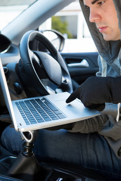 Thief Using Laptop To Hack Into Car Security Software