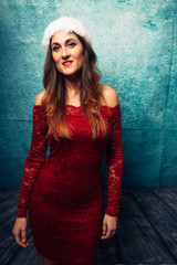 Naklejka premium Christmas Girl in red Dress