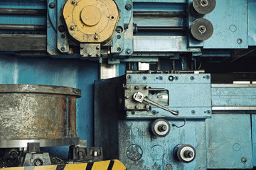Obraz na płótnie Canvas Mechanical engineering.Lathe machine cutting iron taken closeup.