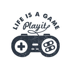 Hand drawn 90s themed badge with gamepad textured vector illustration and "Life is a game. Play it!" inspirational lettering. © SlothAstronaut