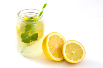 Lemonade drink in a jar glass isolated on white background
