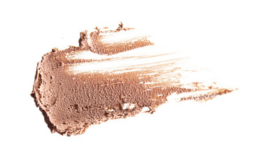 Smudged liquid foundation isolated on white
