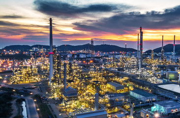 Oil refinery with a background of the city.The factory is located in the middle of nature and no emissions. The area around the air pure.business logistic.Aerial view .Top view.