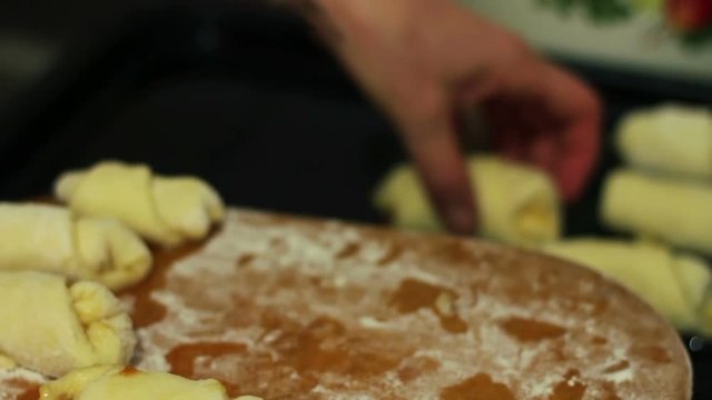 homemade croissants which are laid out on a baking sheet