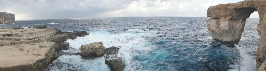 Azure Window, famous stone arch of Gozo island in the sun in summer, Malta