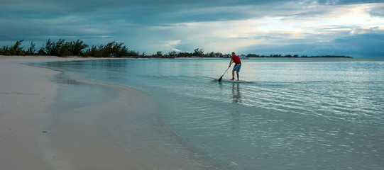 Man with paddle at Bahamas