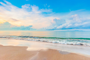 Fototapeta na wymiar beautiful sunrise on the beach in summer relaxing time