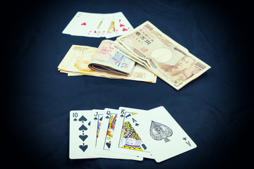 abstract scene of poker card play on japan money - can use to display or montage on product