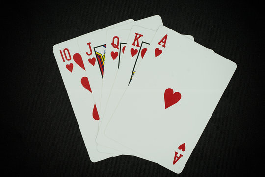 red heart state flash poker card on black frabic - can use to display or montage on product