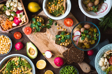 Feast with various salads and sandwiches