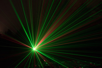 Red and Green Laser Light Rays - obrazy, fototapety, plakaty