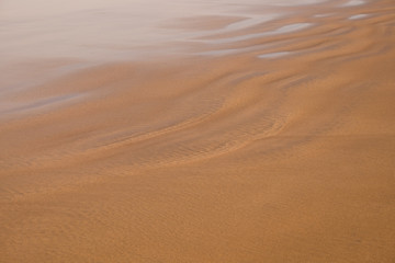 Fototapeta na wymiar Sandy beach textured background
