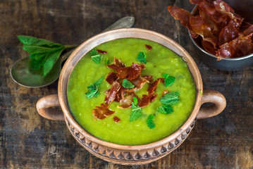 Pea and mint soup with crispy proscuitto strips