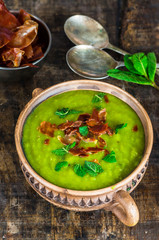Pea and mint soup with crispy proscuitto strips