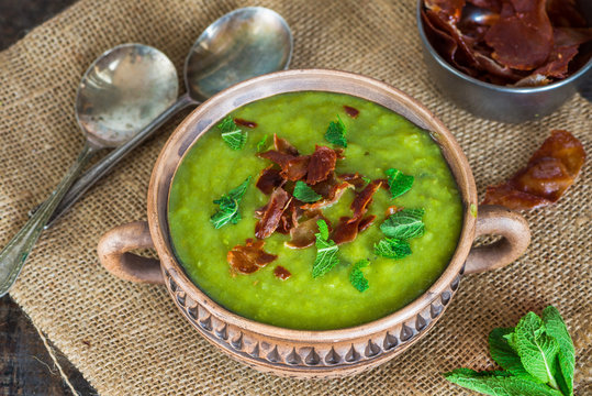 Pea and mint soup with crispy proscuitto strips