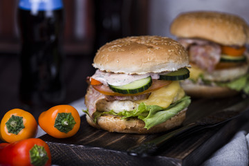 homemade chikenburgers with fresh vegetables