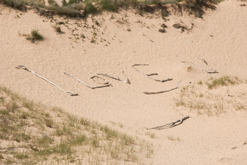 I love you sticks on a sand dune at Sleeping Bear Dunes