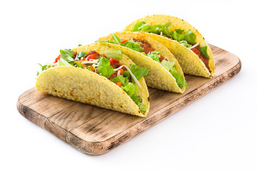 Traditional Mexican tacos with meat and vegetables, isolated on white background
