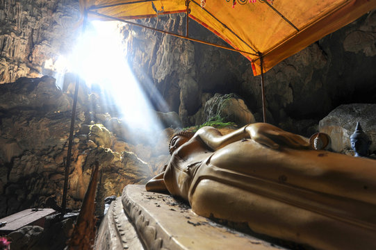 Bronze Thai Buddha in Tham Phu Kham cave