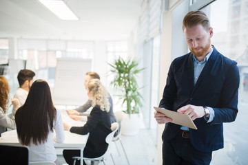 Handsome businessman ceo working in office