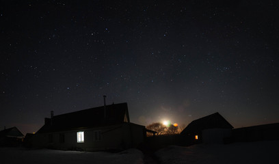Village house winter night