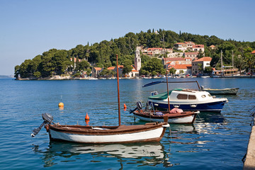 Fototapeta na wymiar Seaside village of Cavtat with fishing boats in the harbor