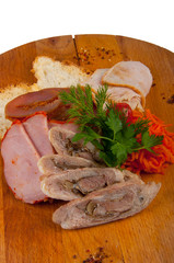 assorted meats on a wooden Board. concept: snacks