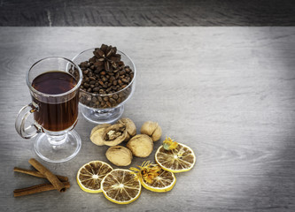 Glass with dark drink.