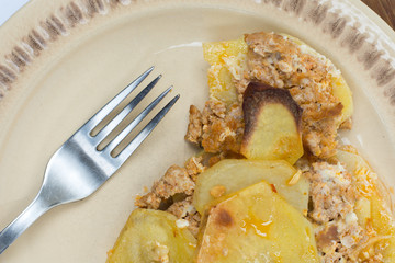 Closeup macro of served fresh mousaka on the plate