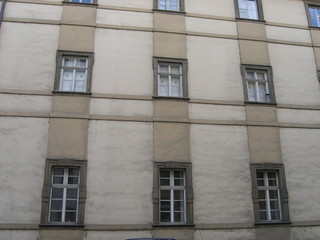 Obraz premium windows square patern on an old facade