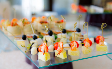 Delicacies and snacks in the buffet. Seafood. A gala reception. Banquet. Catering.