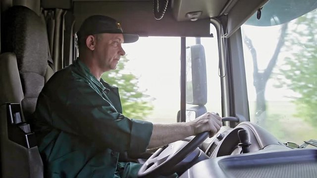 Truck Driver in the Car Delivery Service.