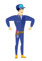 Young asian angry mechanic screaming.